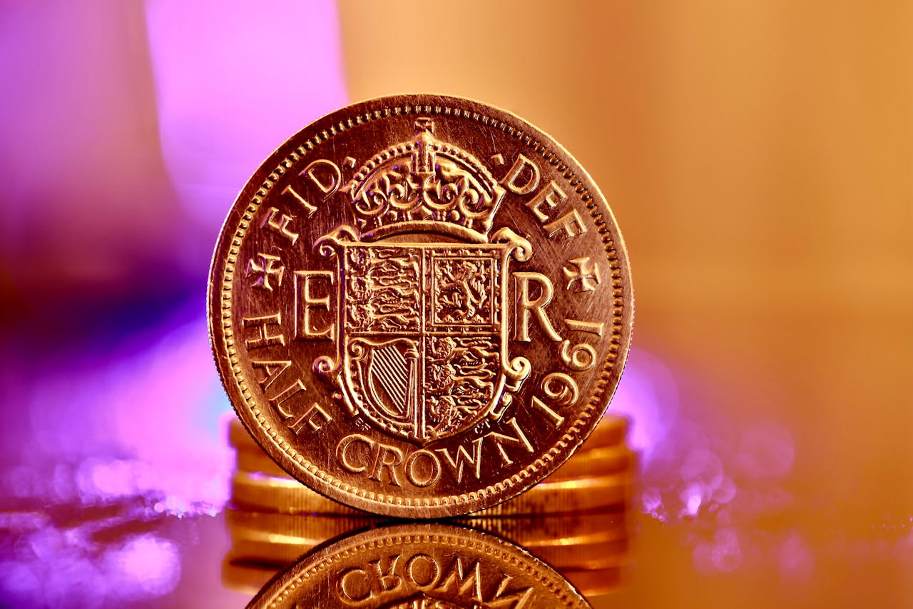 The Art of Drawing Readers In: Your attractive post title goes here Detailed close-up of a vintage 1961 half crown coin with golden tones and purple bokeh background.